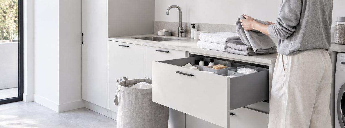 Calm organised laundry room showing a practical everyday home routine