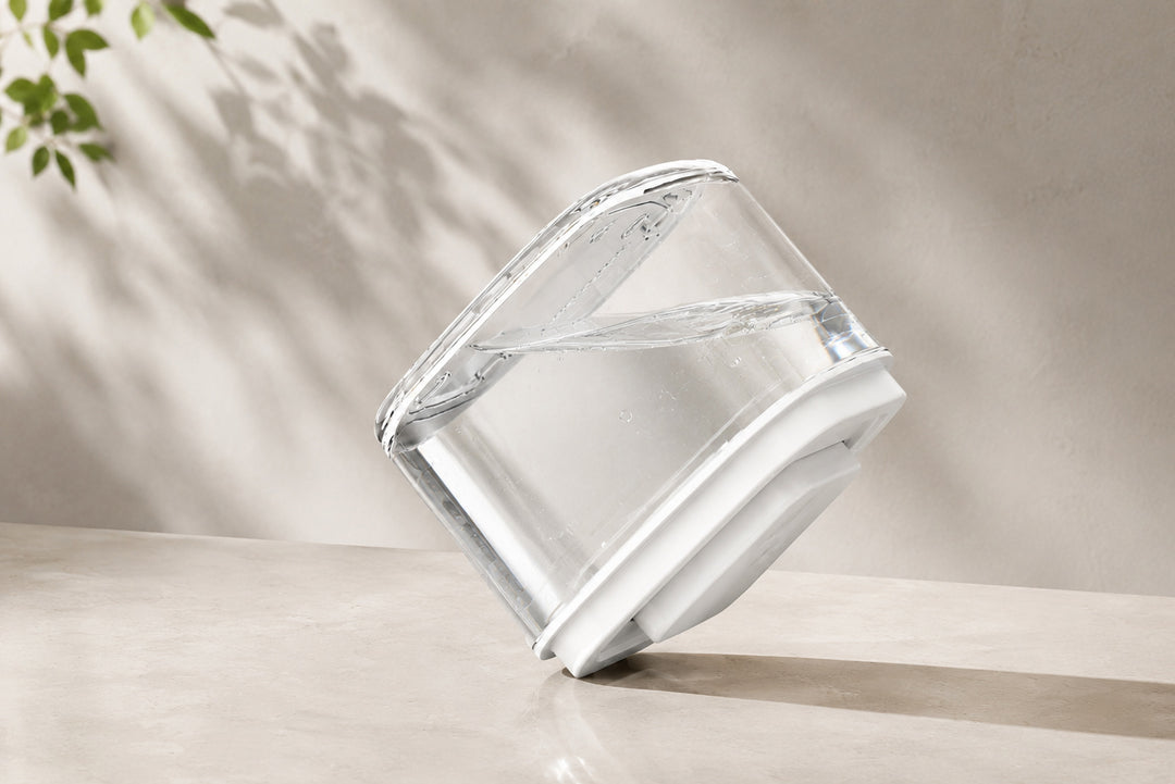 Airtight food storage container tilted with water inside to demonstrate its leakproof seal