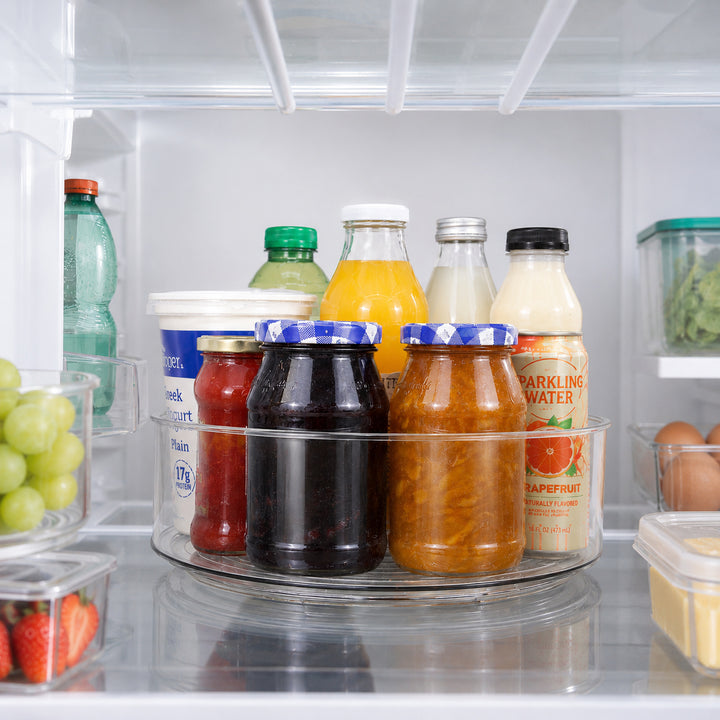 Clear Lazy Susan Turntable organizing condiments and drinks inside a refrigerator