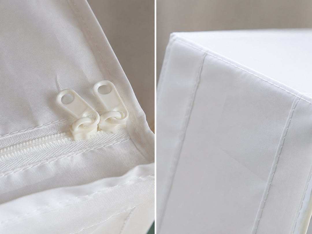 Close-up of dual resin zippers and stitched recycled polyester fabric on the foldable under-bed storage organizer