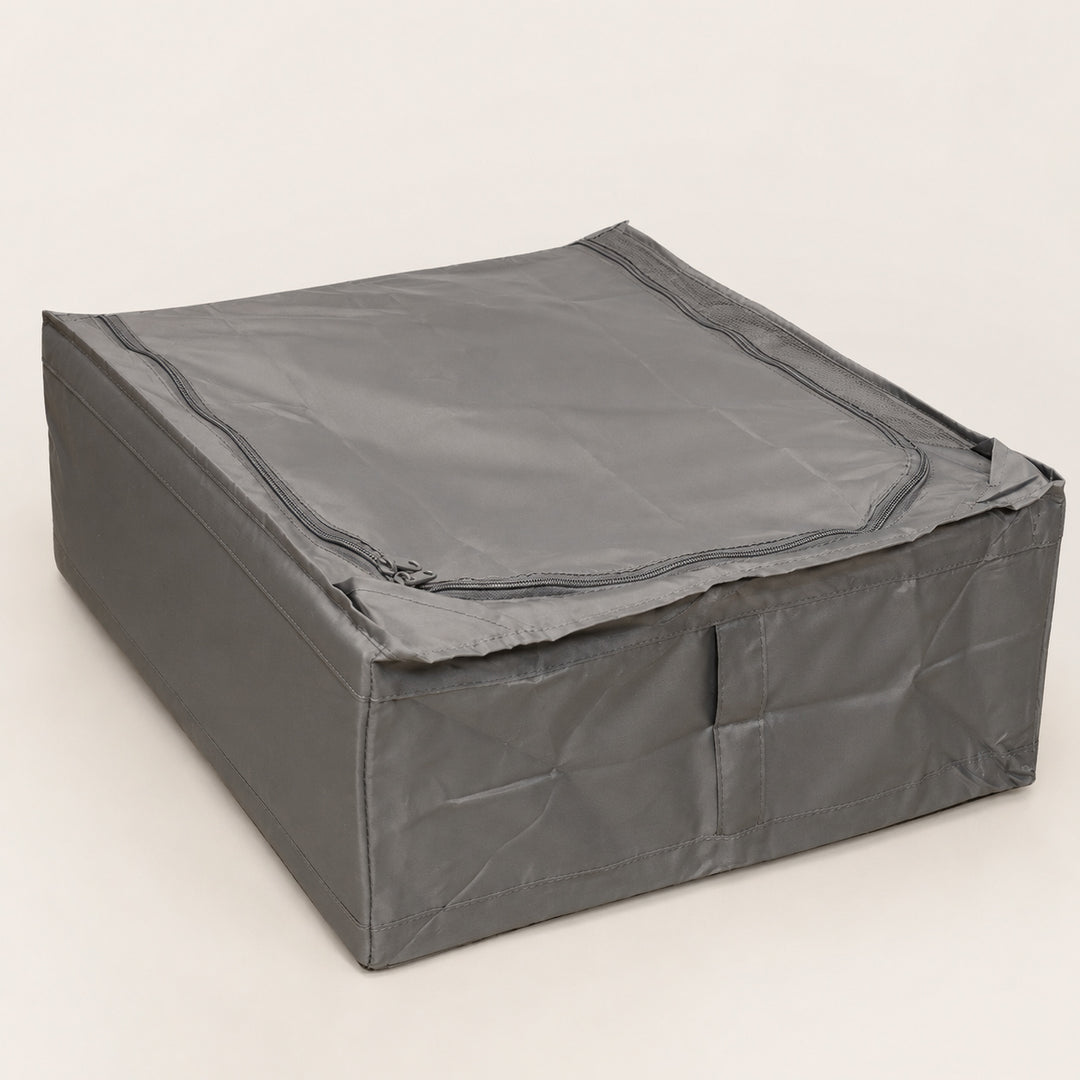 A dark gray fabric storage bin with a zippered lid, shown on a plain light beige background.