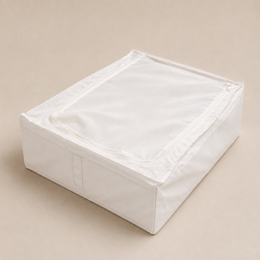 A white fabric storage bin with a zippered lid, shown on a solid beige background.