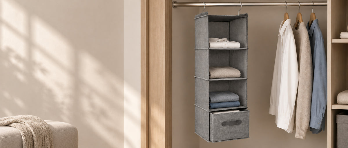 Grey hanging wardrobe organizer with drawer in a modern bedroom wardrobe