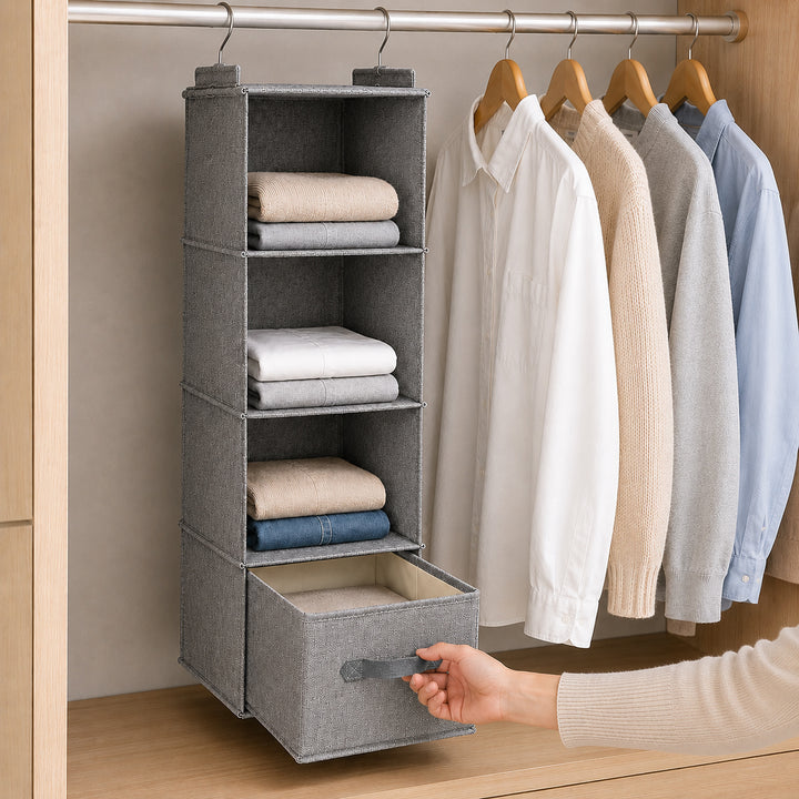 Grey hanging wardrobe organizer with pull-out small drawer in a modern wardrobe